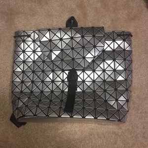 Silver geometric “purse” backpack